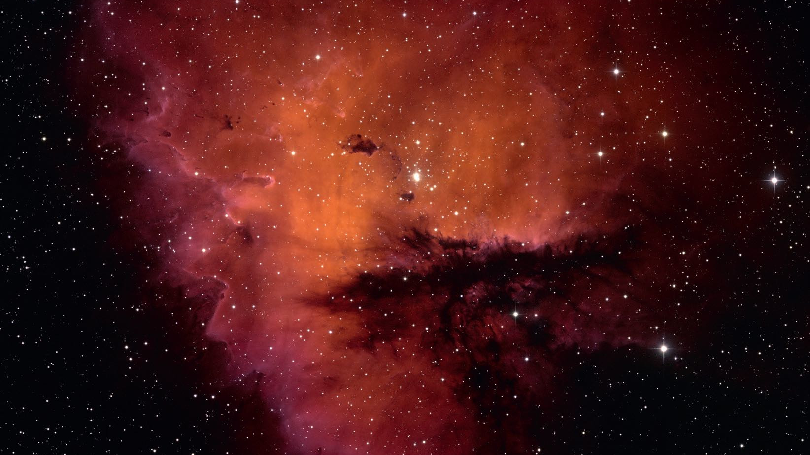 Kształt NGC 281 przypomina Pacmana nie tylko fotograficznie, ale także wizualnie. NSF/AURA/WIYN/T. Rector (University of Alaska)