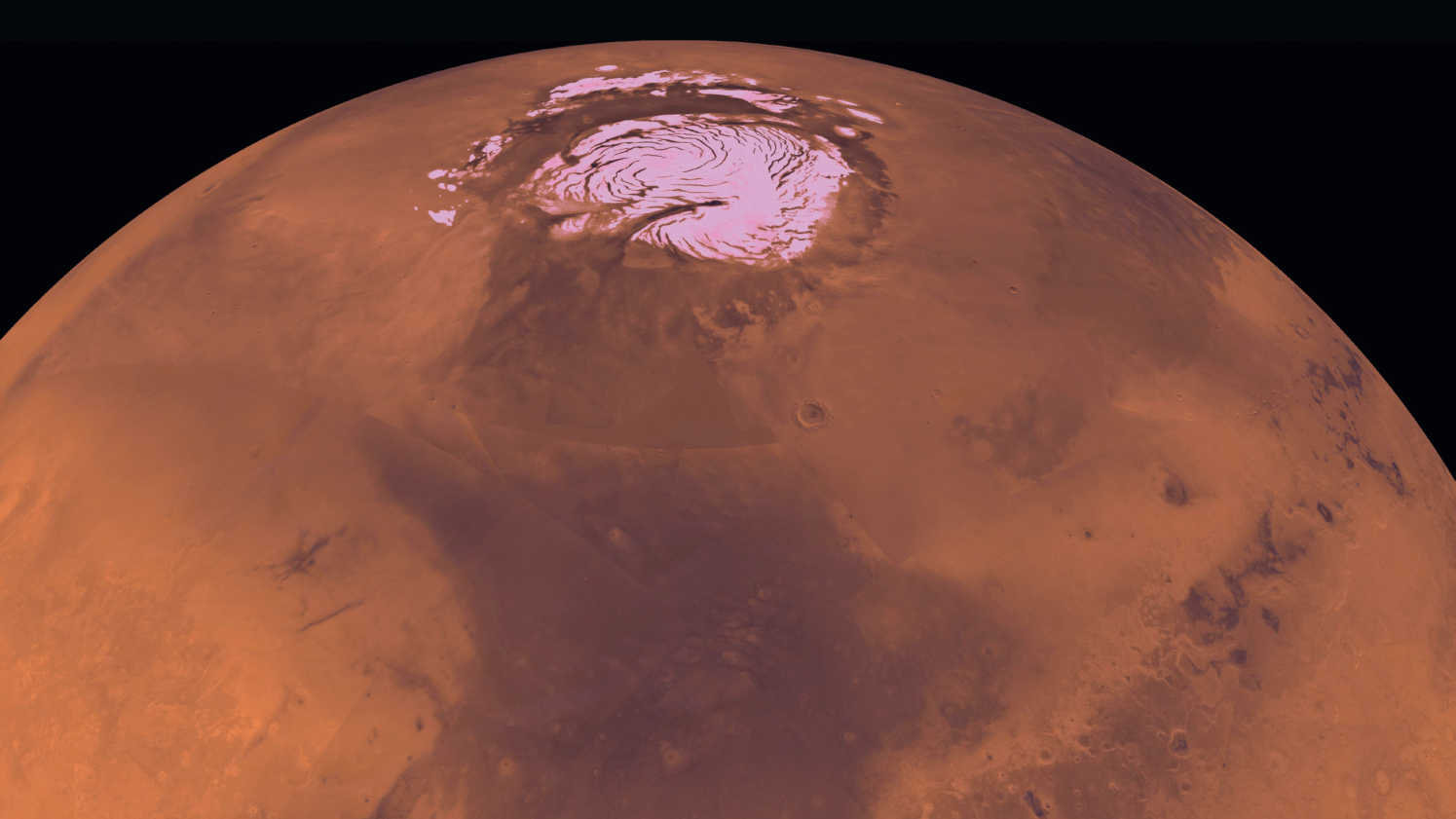 Zdjęcie Marsa wykonane z orbity, z widoczną czapą polarną. NASA/JPL/USGS